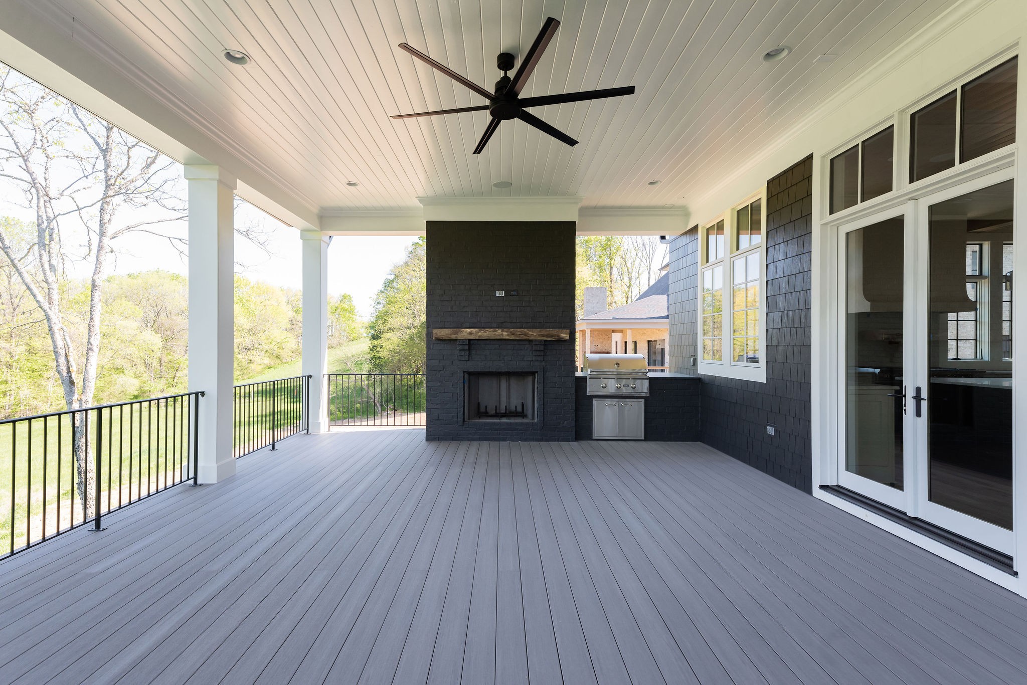 8182 Heirloom Boulevard College Grove, TN 37046 - Photo 32 of 34 a view of an empty room with a window and wooden floor