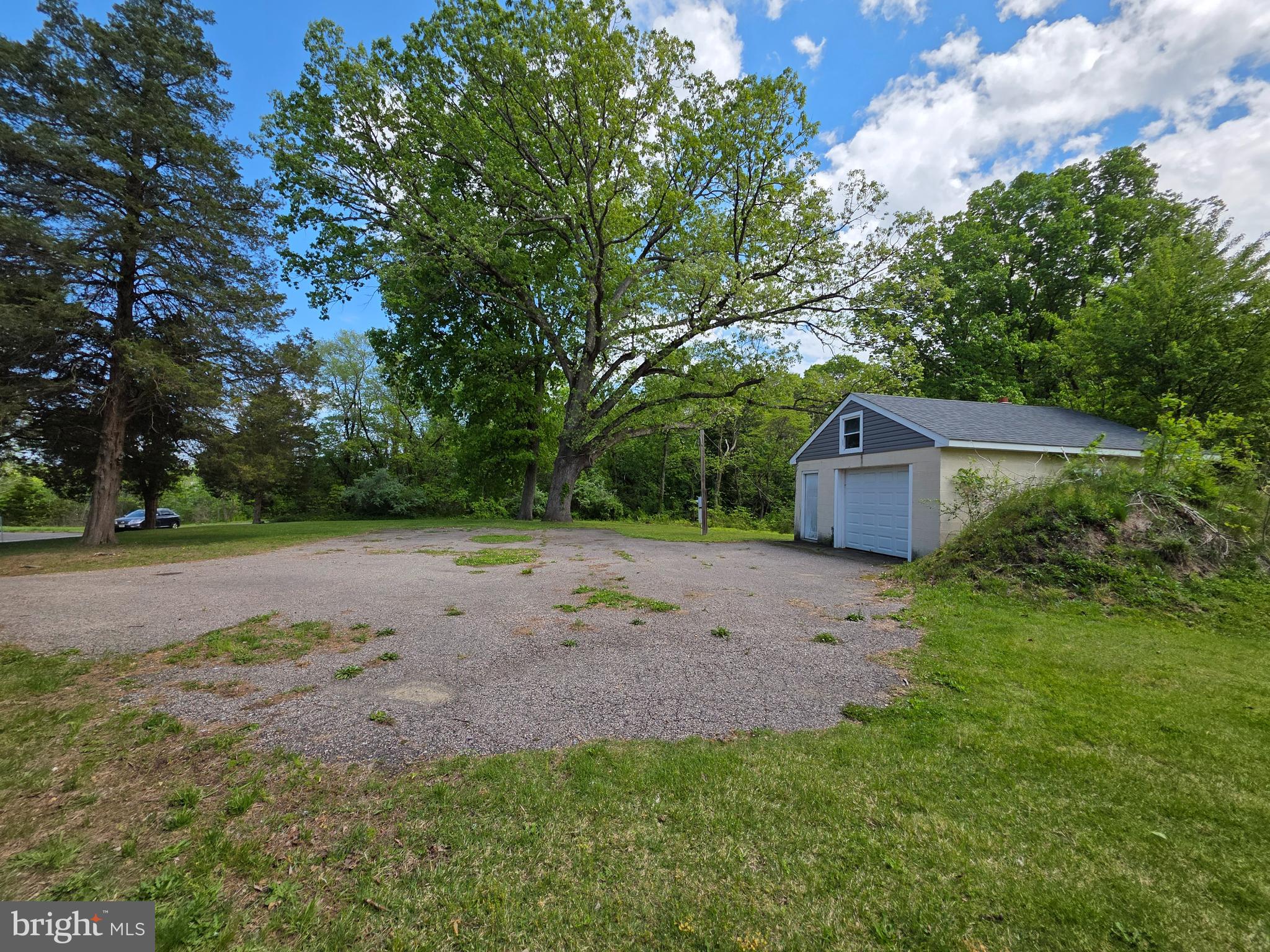 18 West Factory Road Berlin, NJ 08009 - Photo 3 of 8 a view of a dry yard with large trees