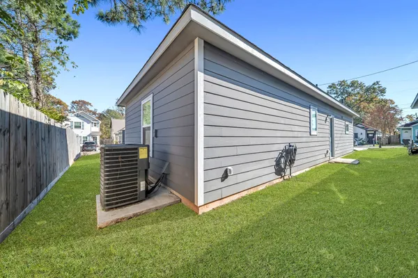 a view of a back yard of the house