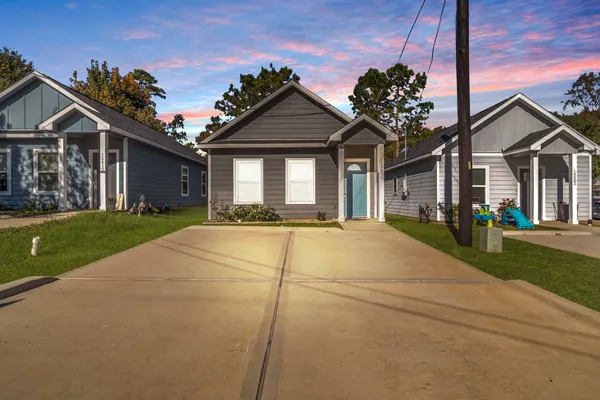 a house with yard in front of it