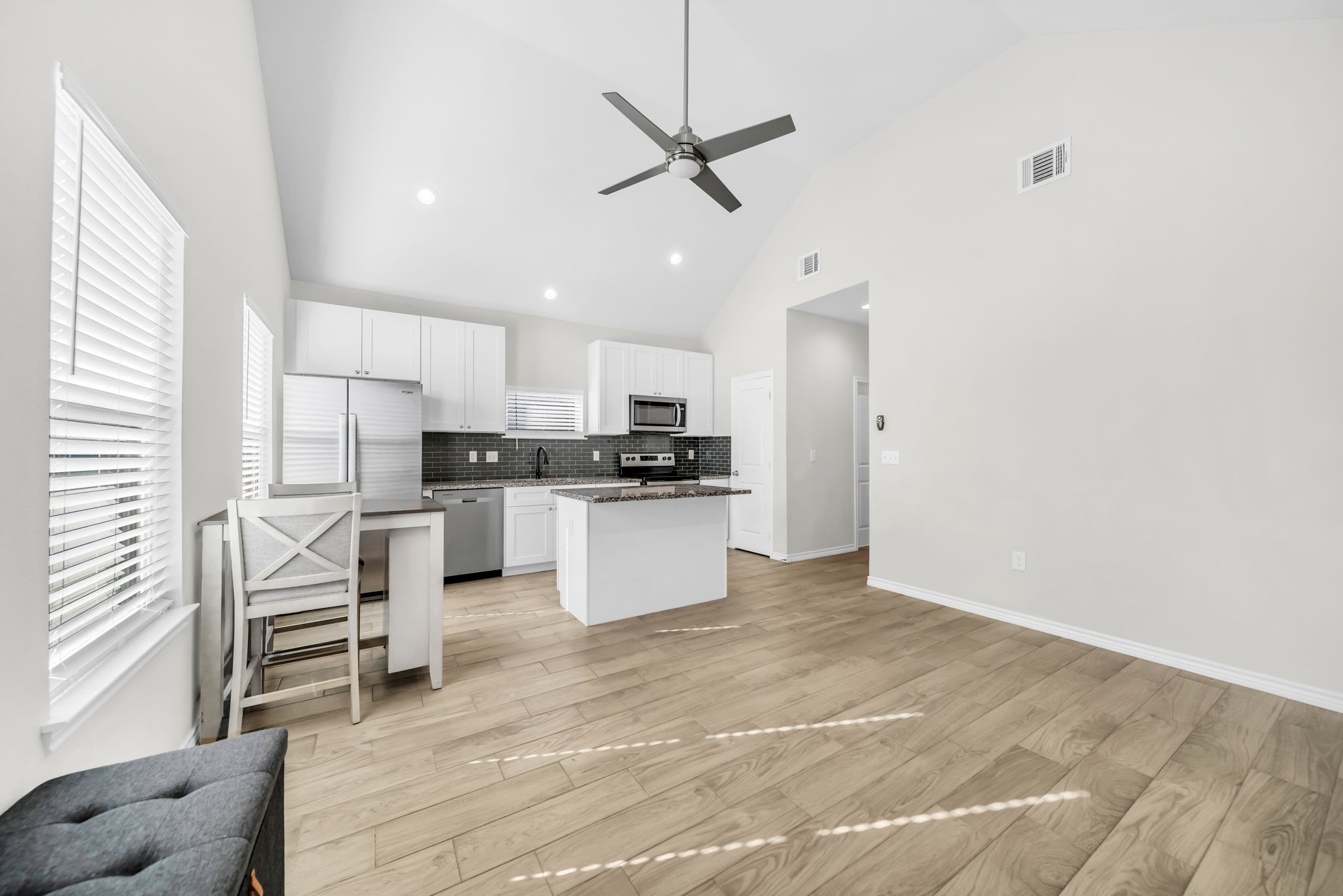 16606 East Forrestal Street Montgomery, TX 77316 - Photo 3 of 14 Beautiful island kitchen that opens up to the family room.