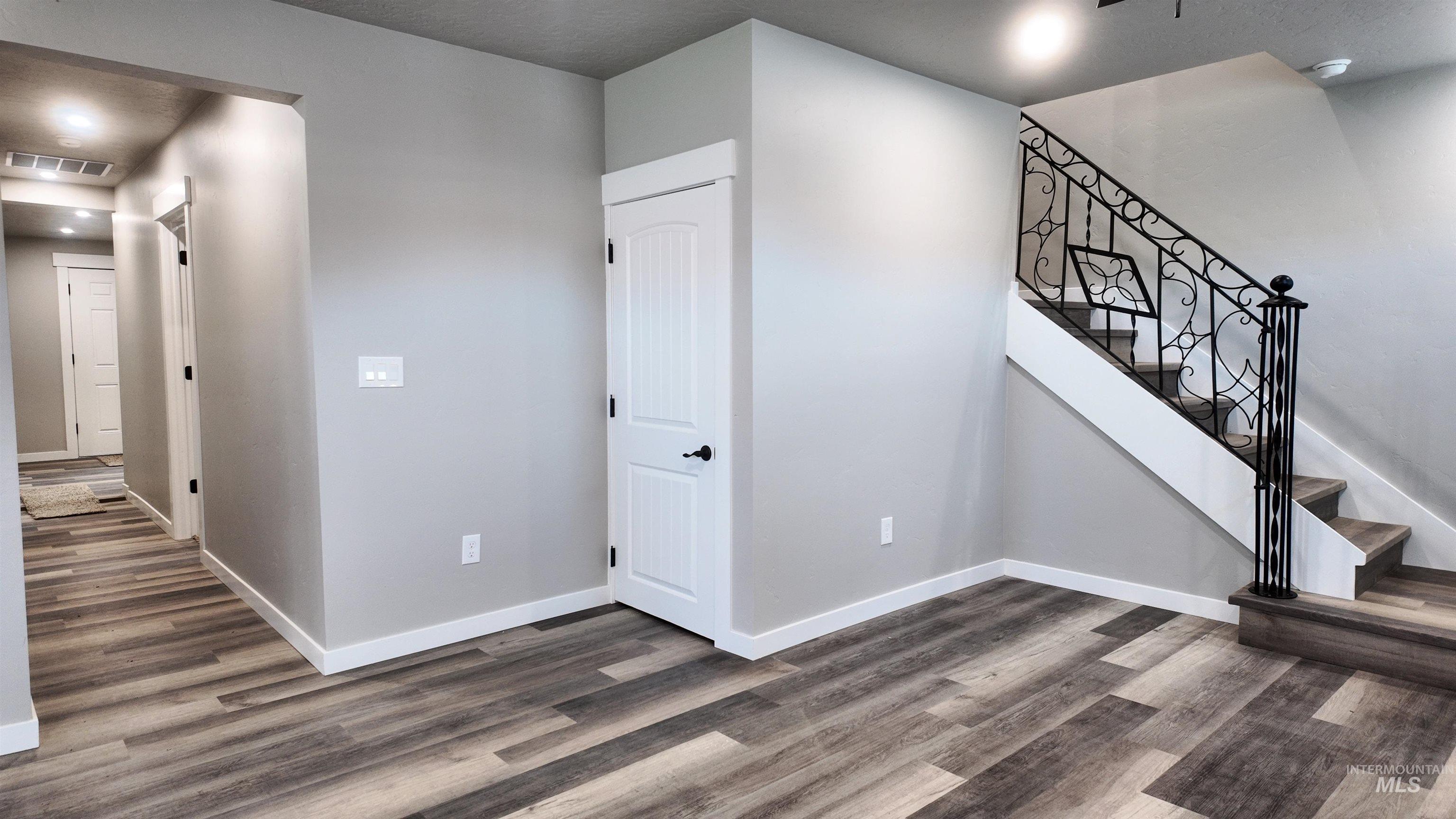 5850 Lockett Road Huntington, OR 97907 - Photo 21 of 49 Interior space featuring stairway, dark wood finished floors, and recessed lighting