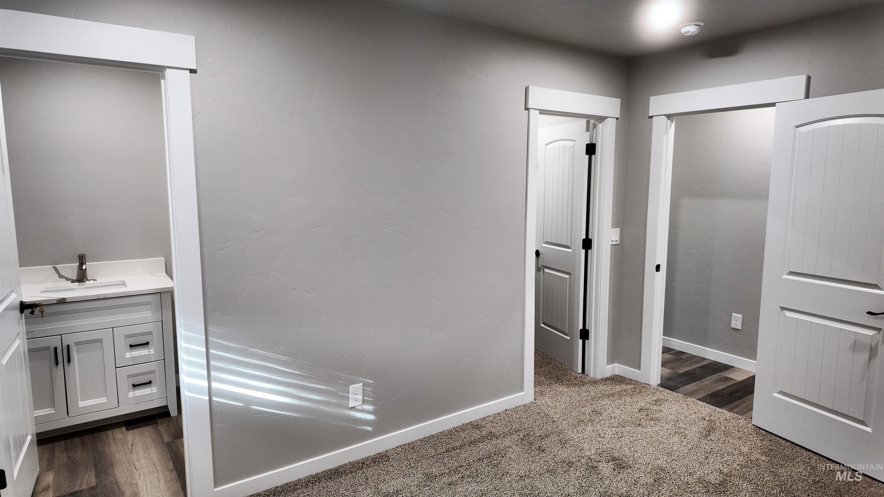 5850 Lockett Road Huntington, OR 97907 - Photo 24 of 49 Bathroom with vanity and wood finished floors