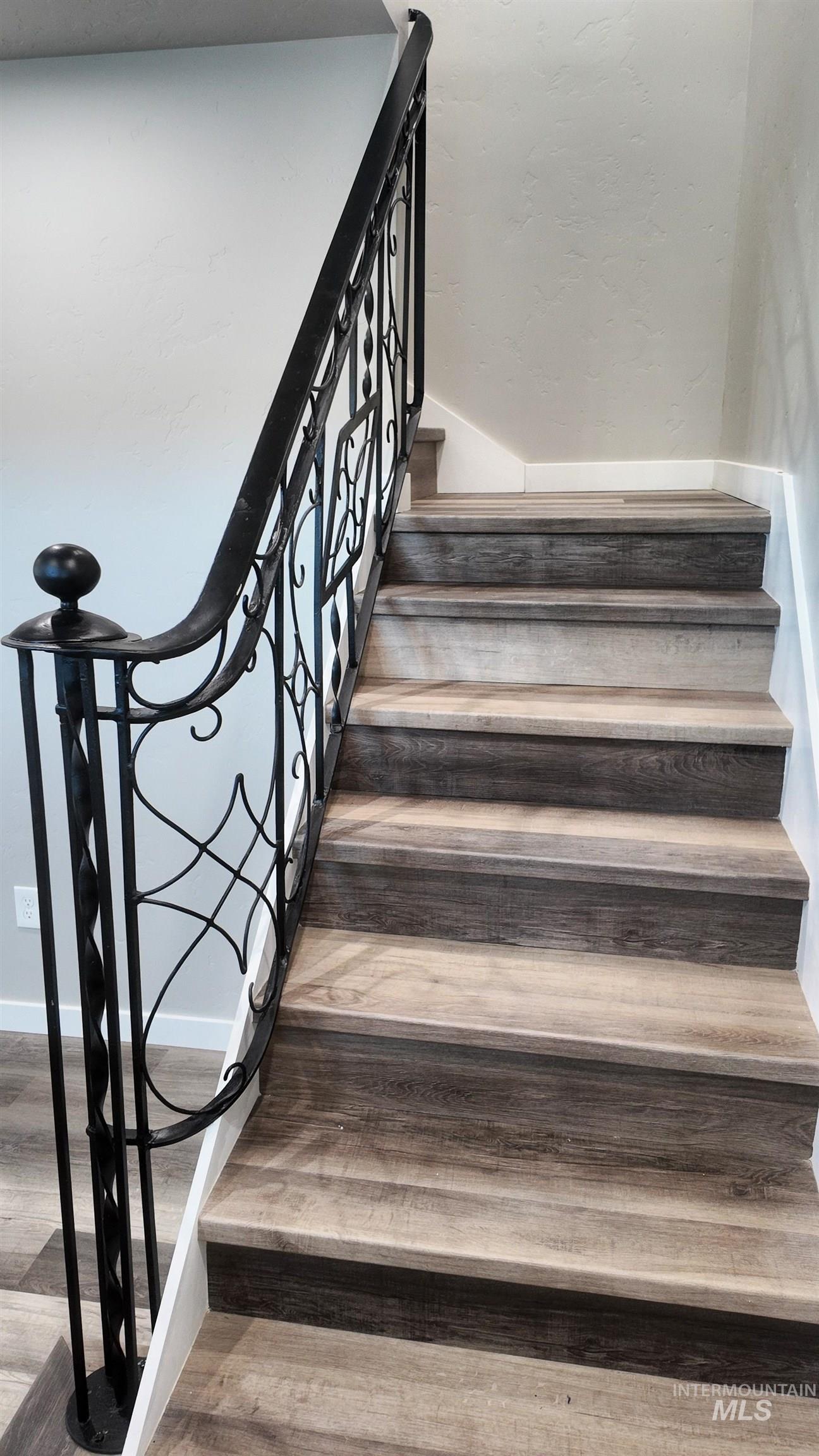 5850 Lockett Road Huntington, OR 97907 - Photo 36 of 49 Stairs featuring wood finished floors and baseboards
