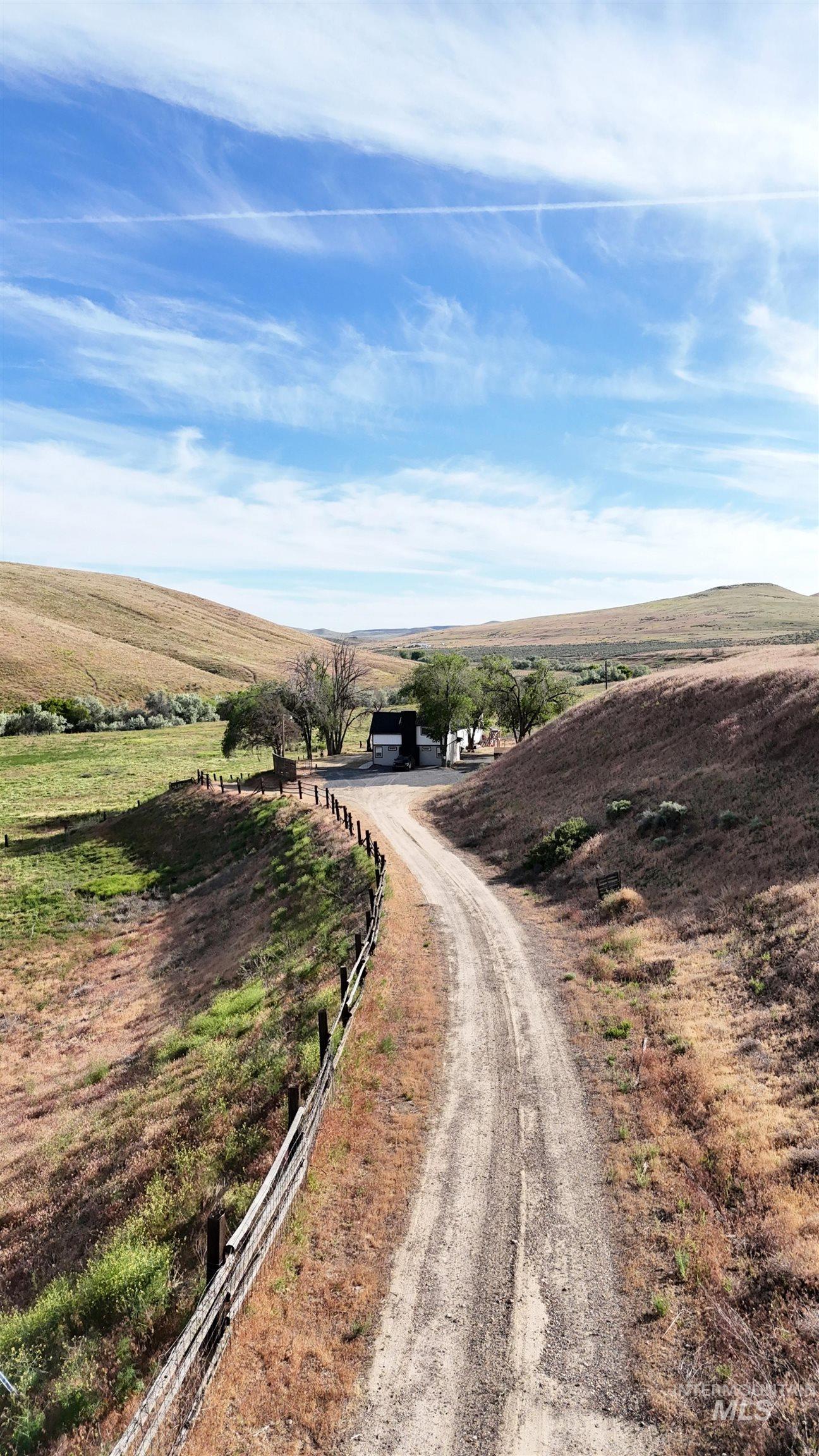 5850 Lockett Road Huntington, OR 97907 - Photo 6 of 49 View of dirt / gravel driveway featuring a view of rural / pastoral area