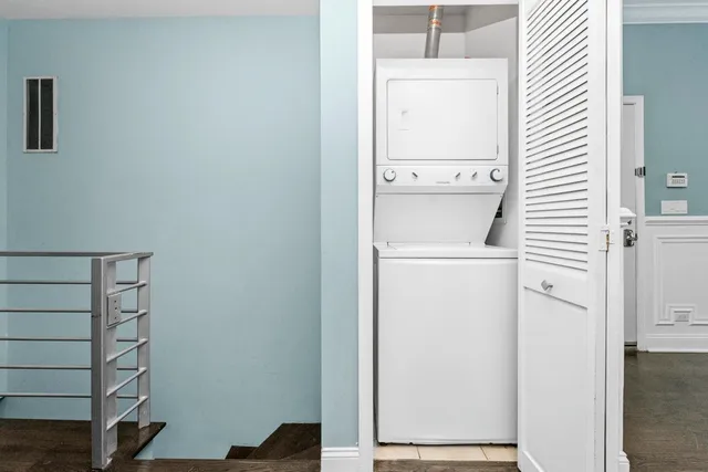 a utility room with dryer and washer
