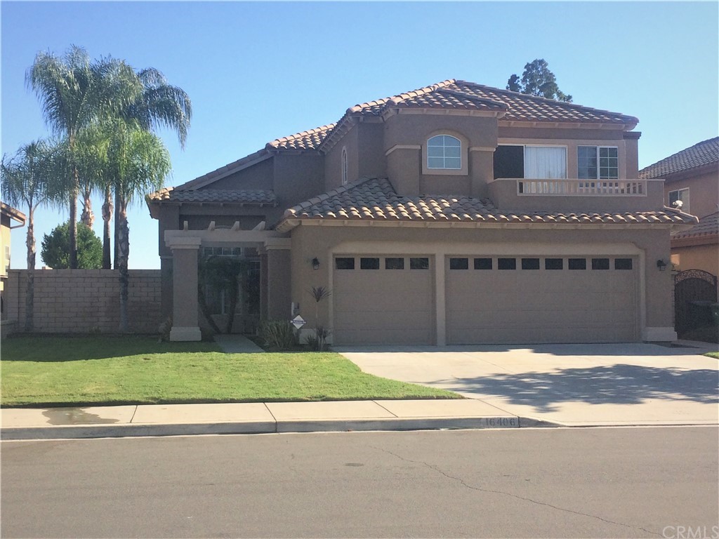 16406 Sun Summit Drive Riverside, CA 92503 - Photo 1 of 1 a front view of a house with a garden and yard