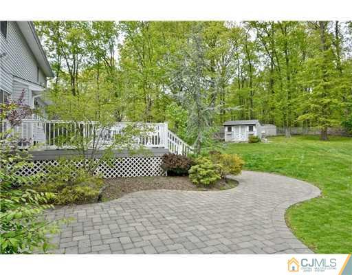 14 Warwick Road Edison, NJ 08820 - Photo 16 of 18 a view of a bench in the garden
