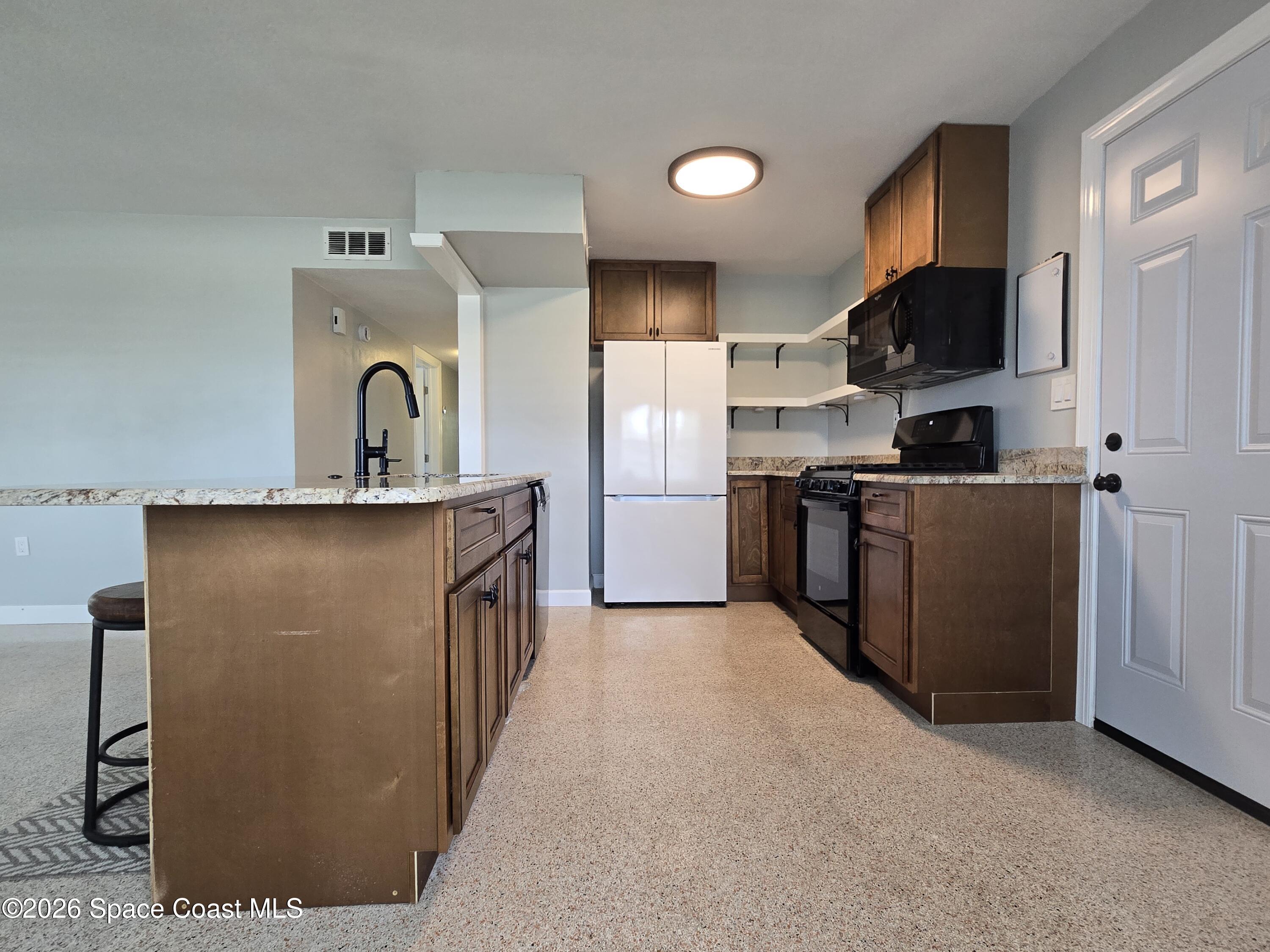 550 Capri Road Cocoa Beach, FL 32931 - Photo 8 of 28 20260602_135630