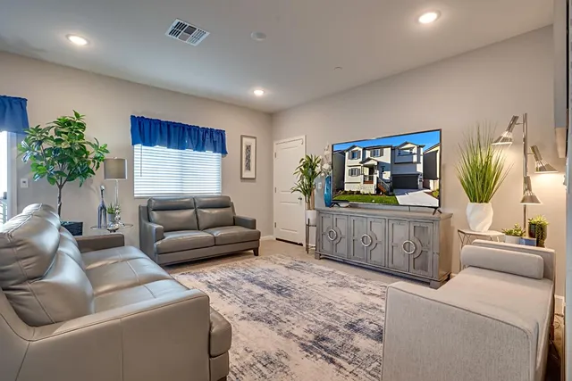 a living room with furniture and a couch