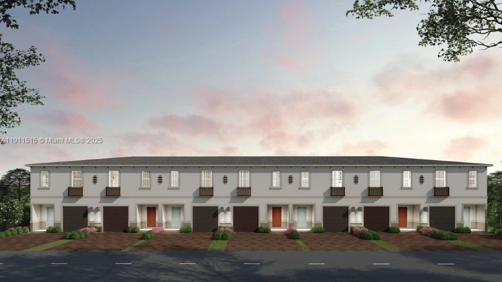 a view of a large building with a big yard