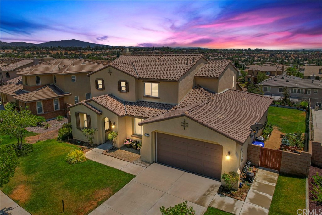 33975 Golden Crown Way Road Yucaipa, CA 92399 - Photo 1 of 1 an aerial view of a house with a big yard