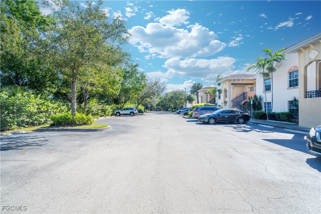 4160 Castilla Circle, Unit 202 Fort Myers, FL 33916 - Photo 22 of 37 a car parked on the side of the road