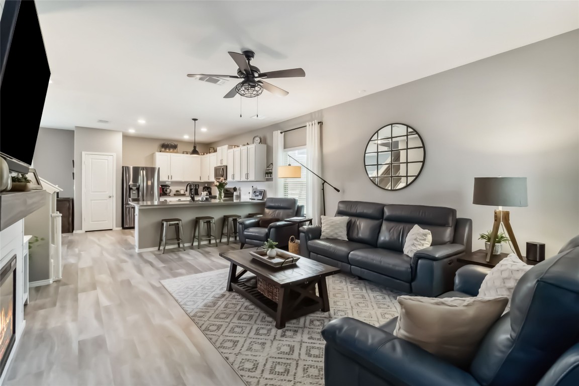 10901 Rome Avenue Austin, TX 78747 - Photo 1 of 1 a living room with furniture and kitchen view
