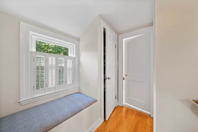 a bathroom with a sink and a window