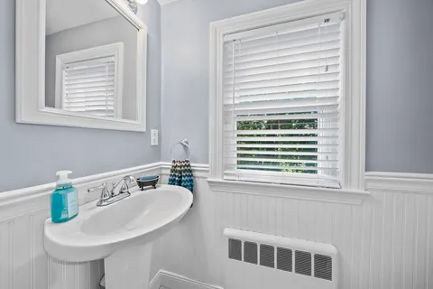 a bathroom with a shower and a toilet