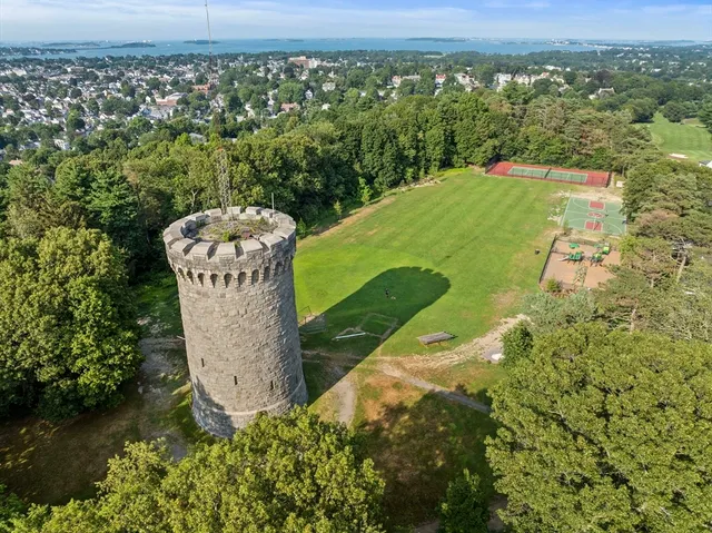 an aerial view of a city with lots of residential buildings