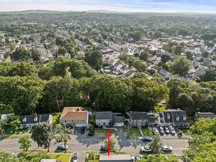 an aerial view of residential house with outdoor space