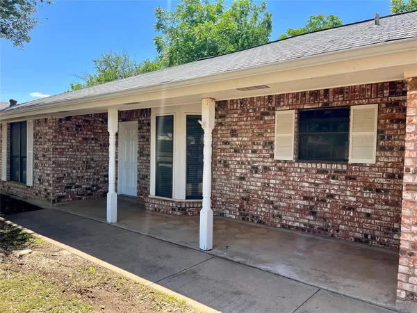 a front view of a house with a garage