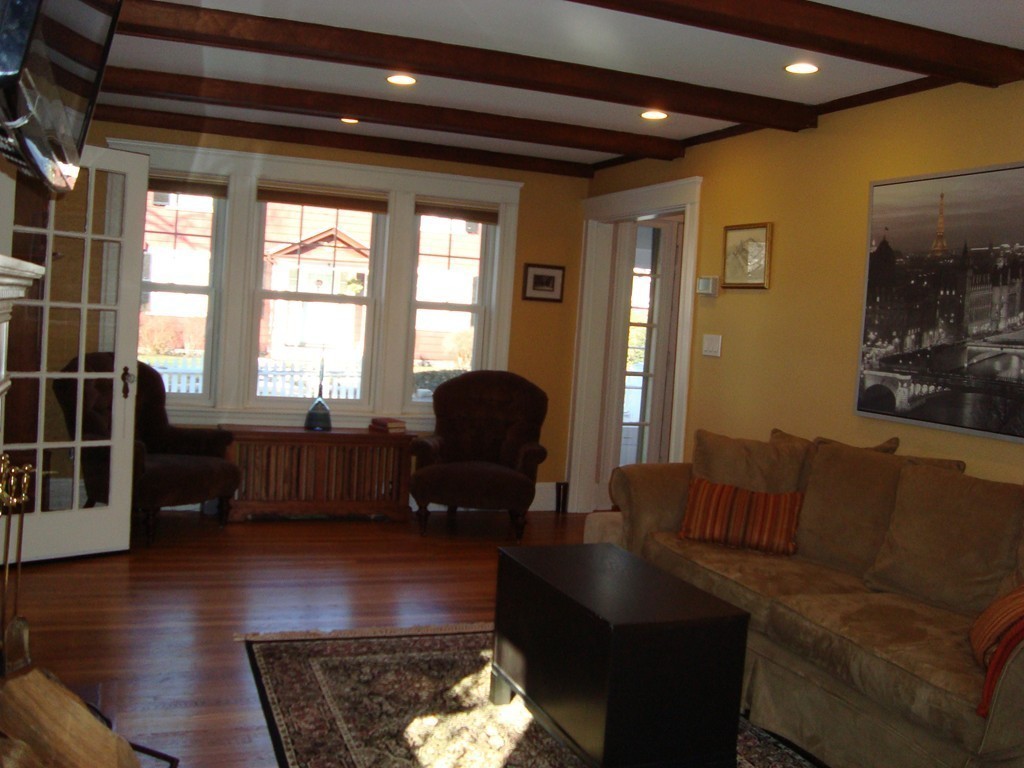 2 Chesterlee Lane Swampscott, MA 01907 - Photo 13 of 29 a living room with furniture and a large window