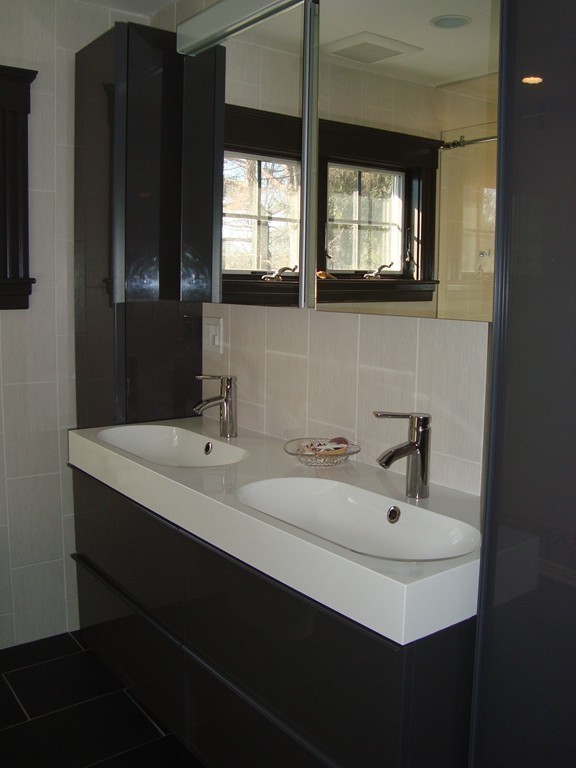 2 Chesterlee Lane Swampscott, MA 01907 - Photo 17 of 29 a bathroom with a sink and a mirror