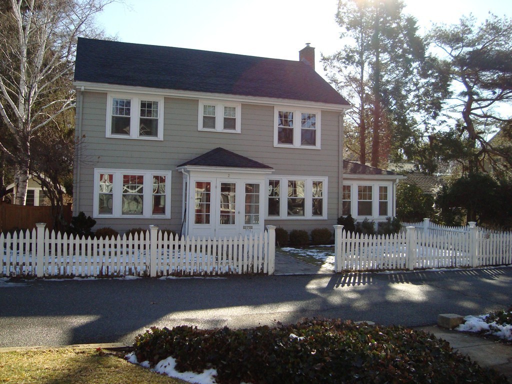 2 Chesterlee Lane Swampscott, MA 01907 - Photo 2 of 29 a front view of a house with a yard