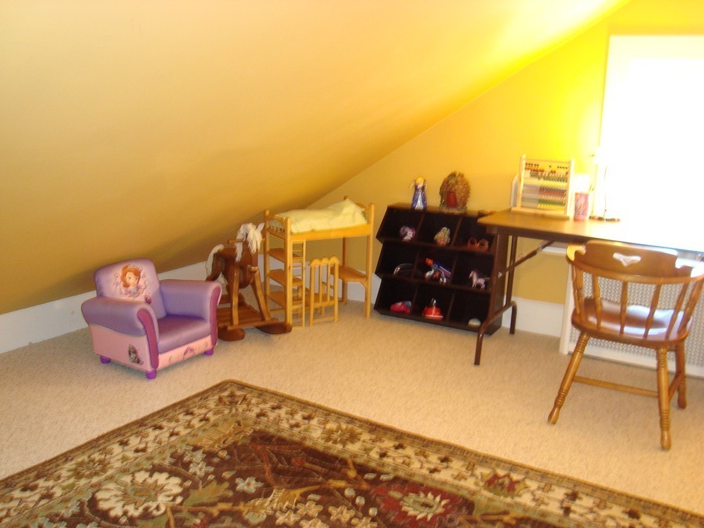 2 Chesterlee Lane Swampscott, MA 01907 - Photo 25 of 29 a living room with furniture and a flat screen tv