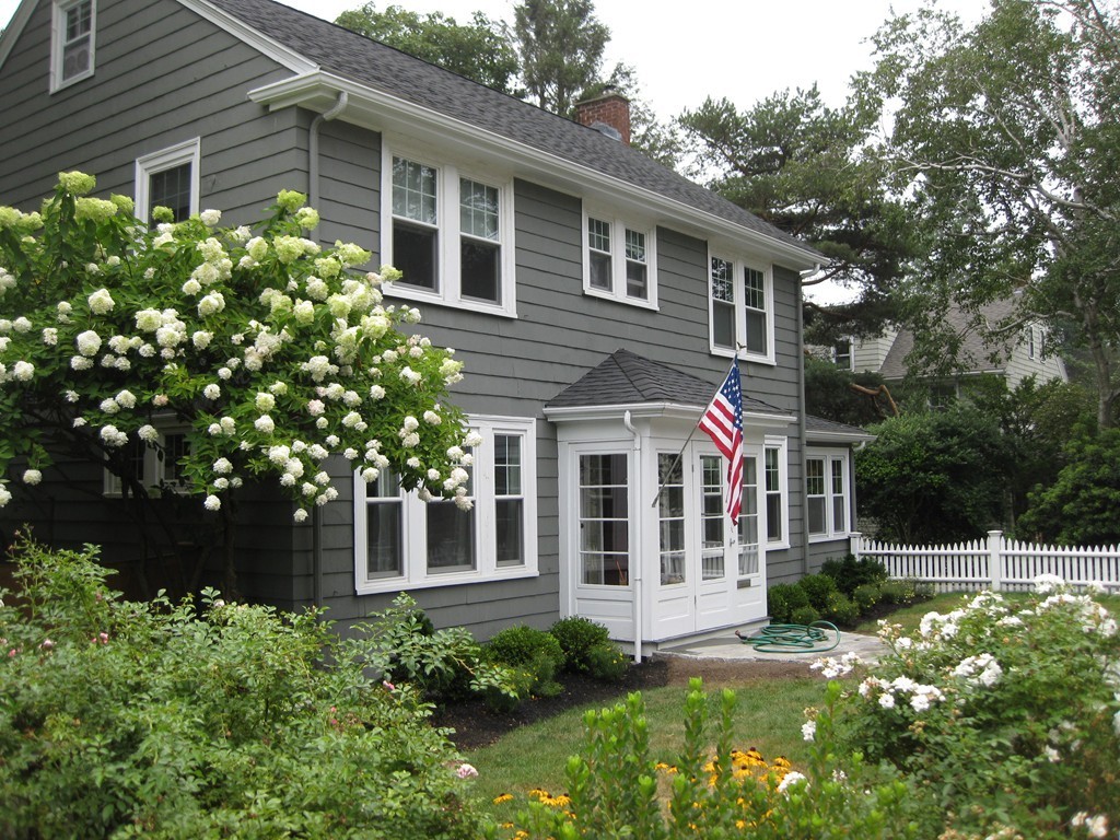 2 Chesterlee Lane Swampscott, MA 01907 - Photo 3 of 29 a front view of a house with a garden