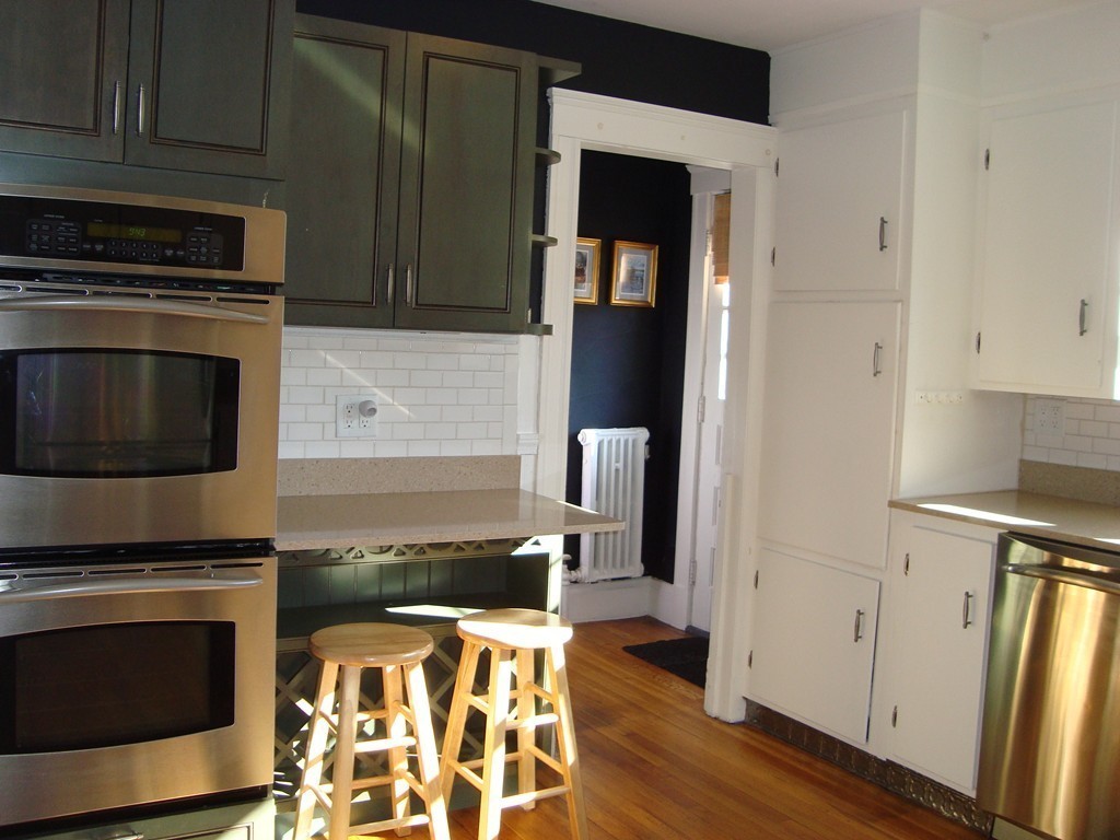 2 Chesterlee Lane Swampscott, MA 01907 - Photo 6 of 29 a kitchen with a stove and a microwave