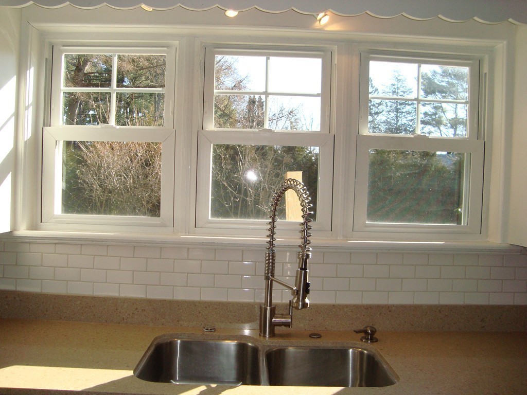 2 Chesterlee Lane Swampscott, MA 01907 - Photo 7 of 29 a bathroom with a sink and a window