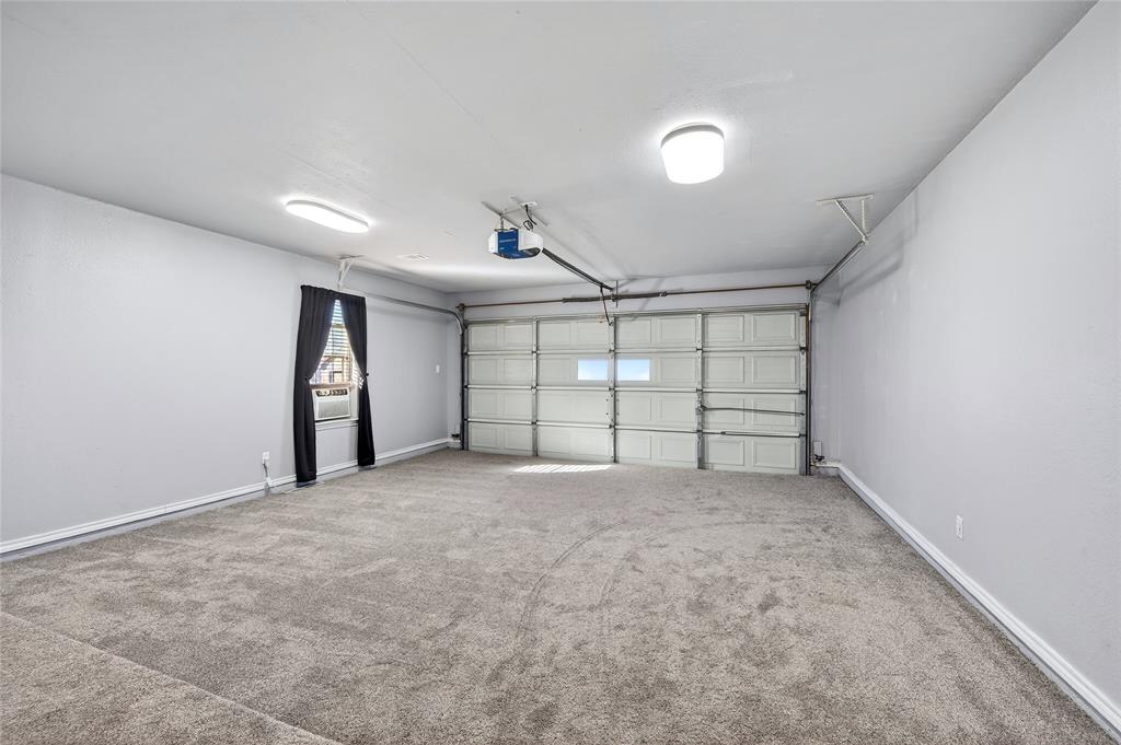 905 Calder Street Howe, TX 75459 - Photo 16 of 35 a view of an empty room with a ceiling fan
