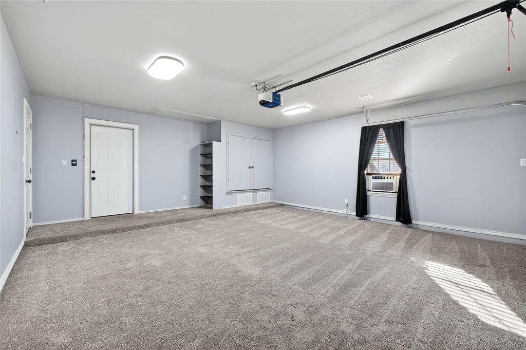 905 Calder Street Howe, TX 75459 - Photo 17 of 35 a view of an empty room with a window