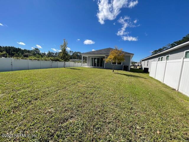 1852 Cogdill Trace Middleburg, FL 32068 - Photo 25 of 25 a view of a house with a yard