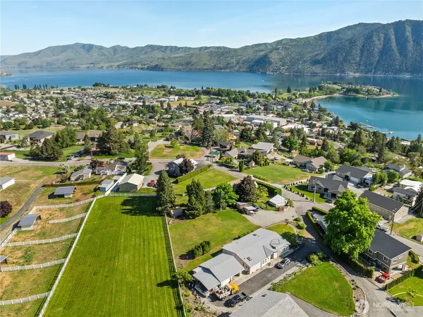 an aerial view of a house with a garden
