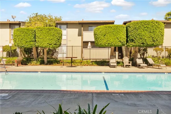 a view of a swimming pool and outdoor space