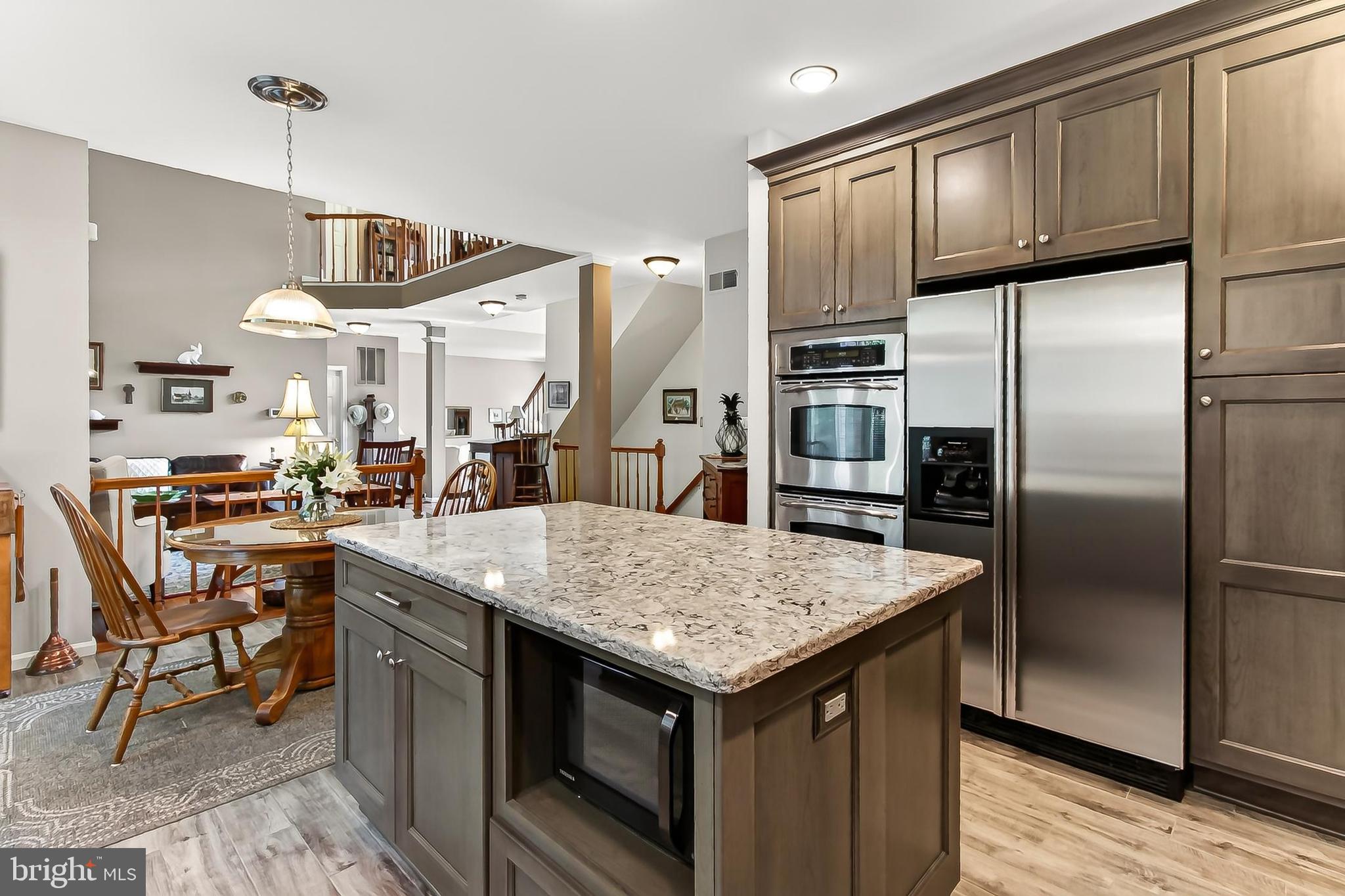 7606 Davis Field Lane Springfield, VA 22153 - Photo 22 of 55 Kitchen, Family room and deck =entertaining ease