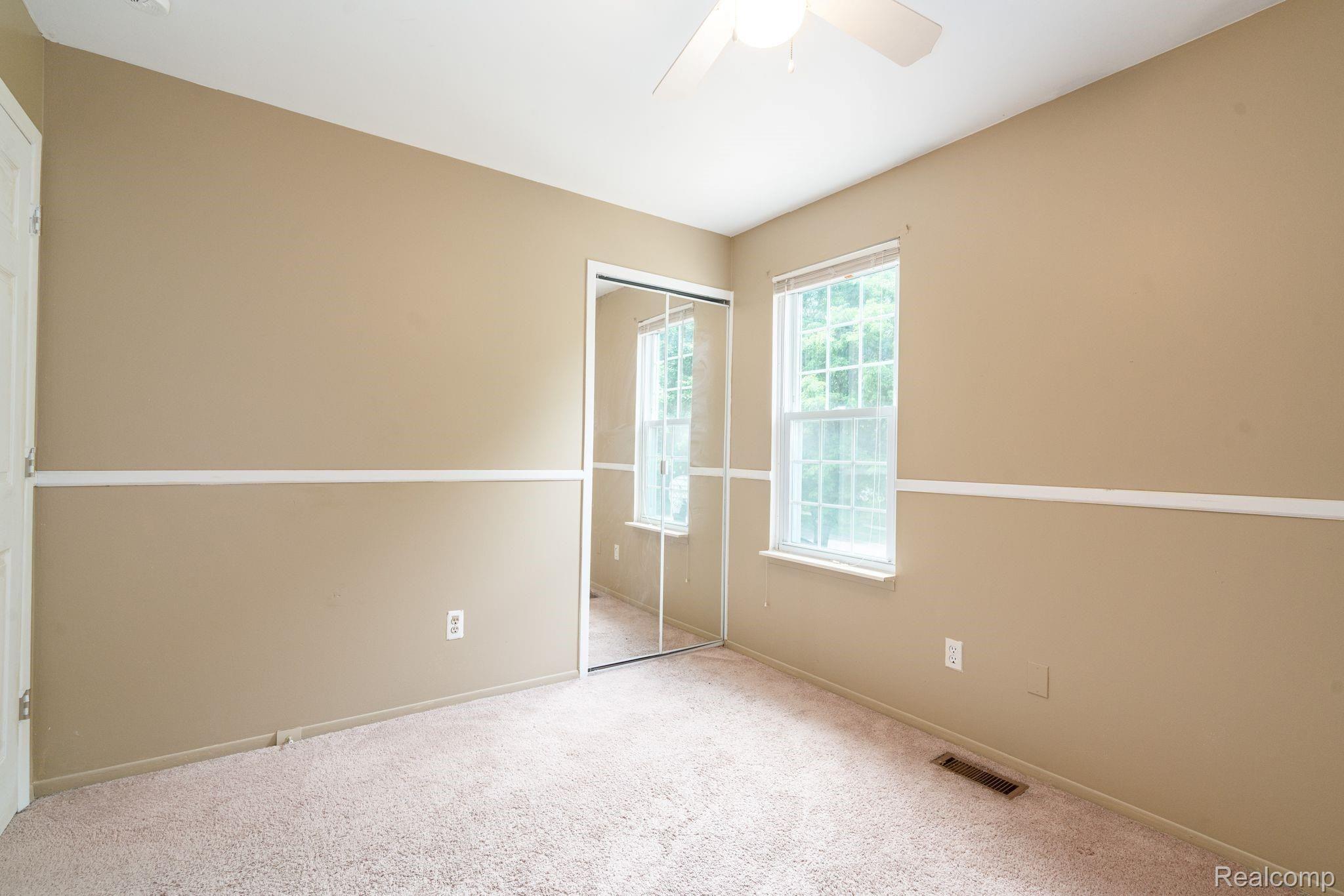 645 Worthington Road Canton, MI 48188 - Photo 17 of 30 Bedroom 3 with mirrored closet and natural light
