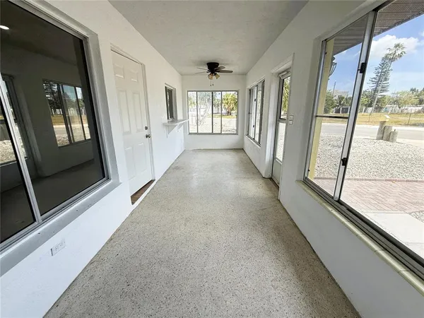 a view of an empty room and window