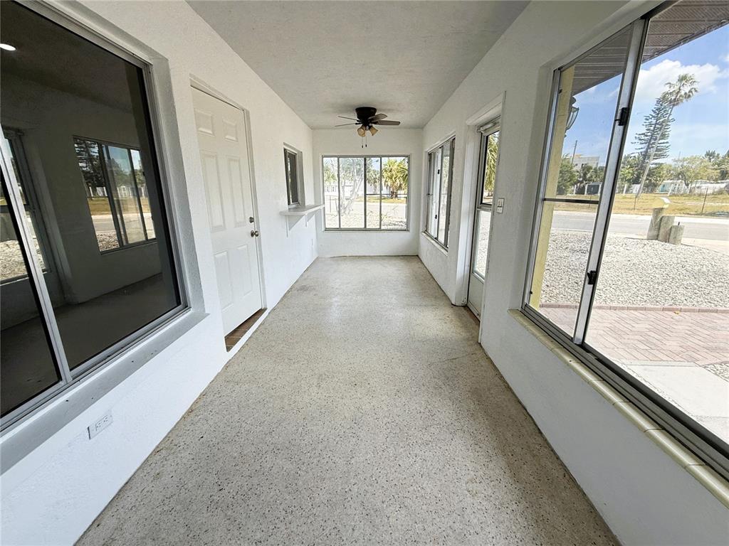 500 140th Avenue East Madeira Beach, FL 33708 - Photo 12 of 30 a view of a hallway with windows