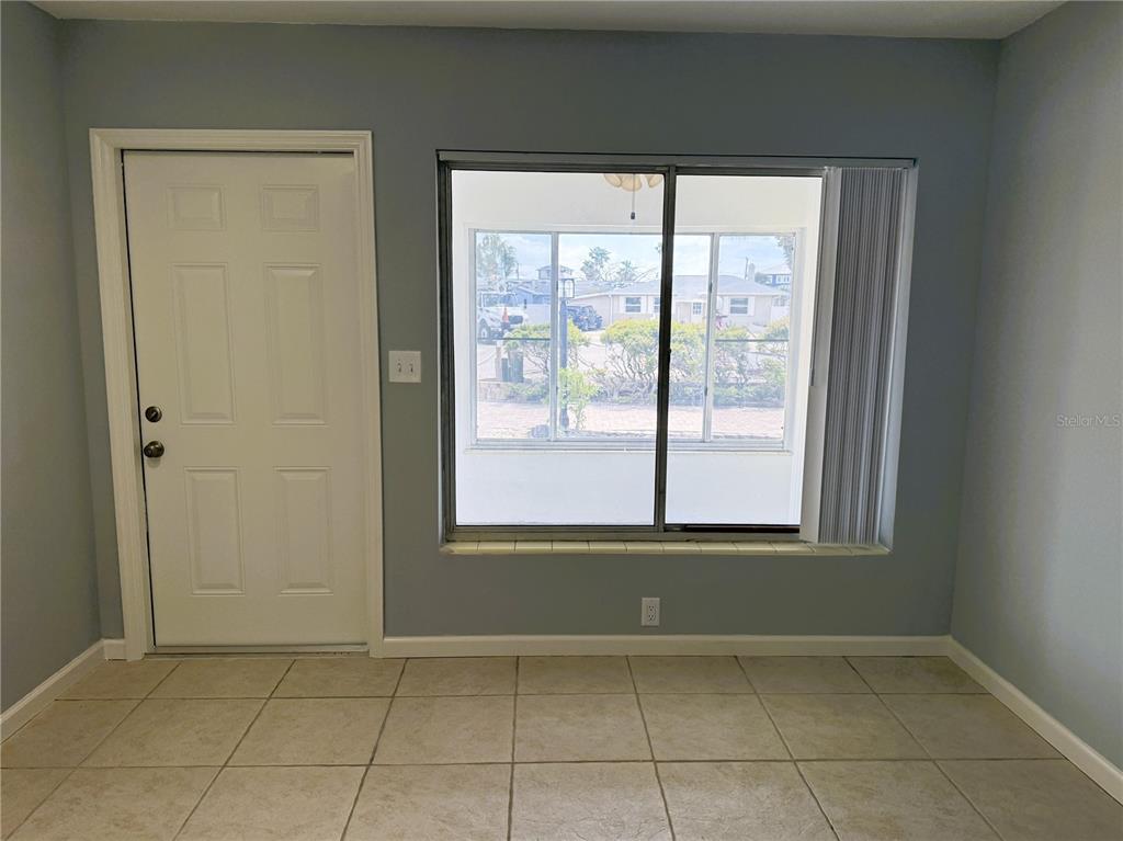 500 140th Avenue East Madeira Beach, FL 33708 - Photo 9 of 30 an empty room with a window