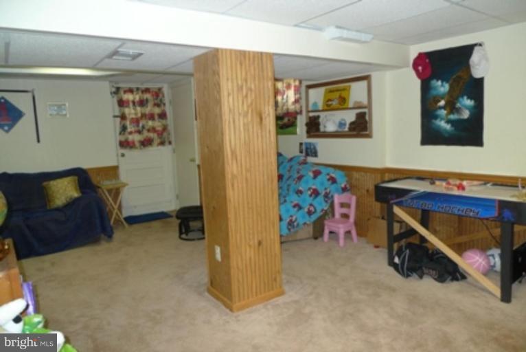 1822 Forrest Road Parkville, MD 21234 - Photo 11 of 21 a view of livingroom with furniture and toys