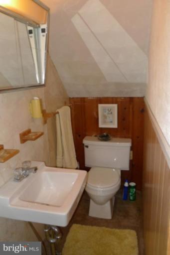 1822 Forrest Road Parkville, MD 21234 - Photo 14 of 21 a bathroom with a toilet and a sink