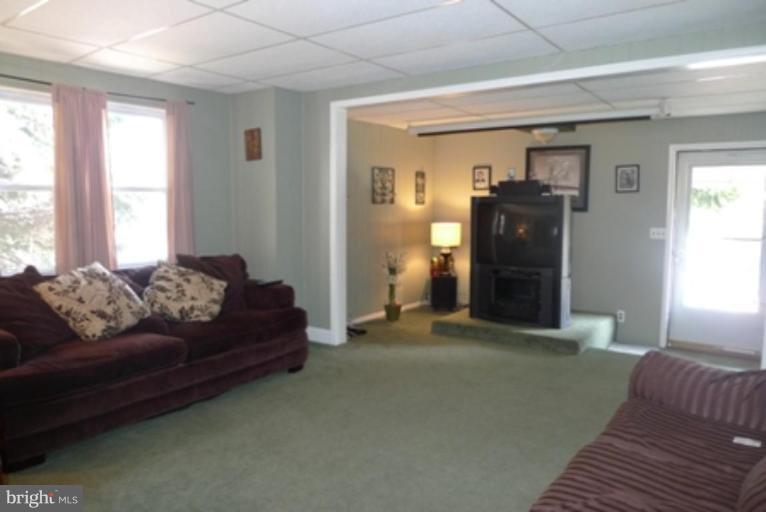 1822 Forrest Road Parkville, MD 21234 - Photo 10 of 21 a living room with furniture and a window