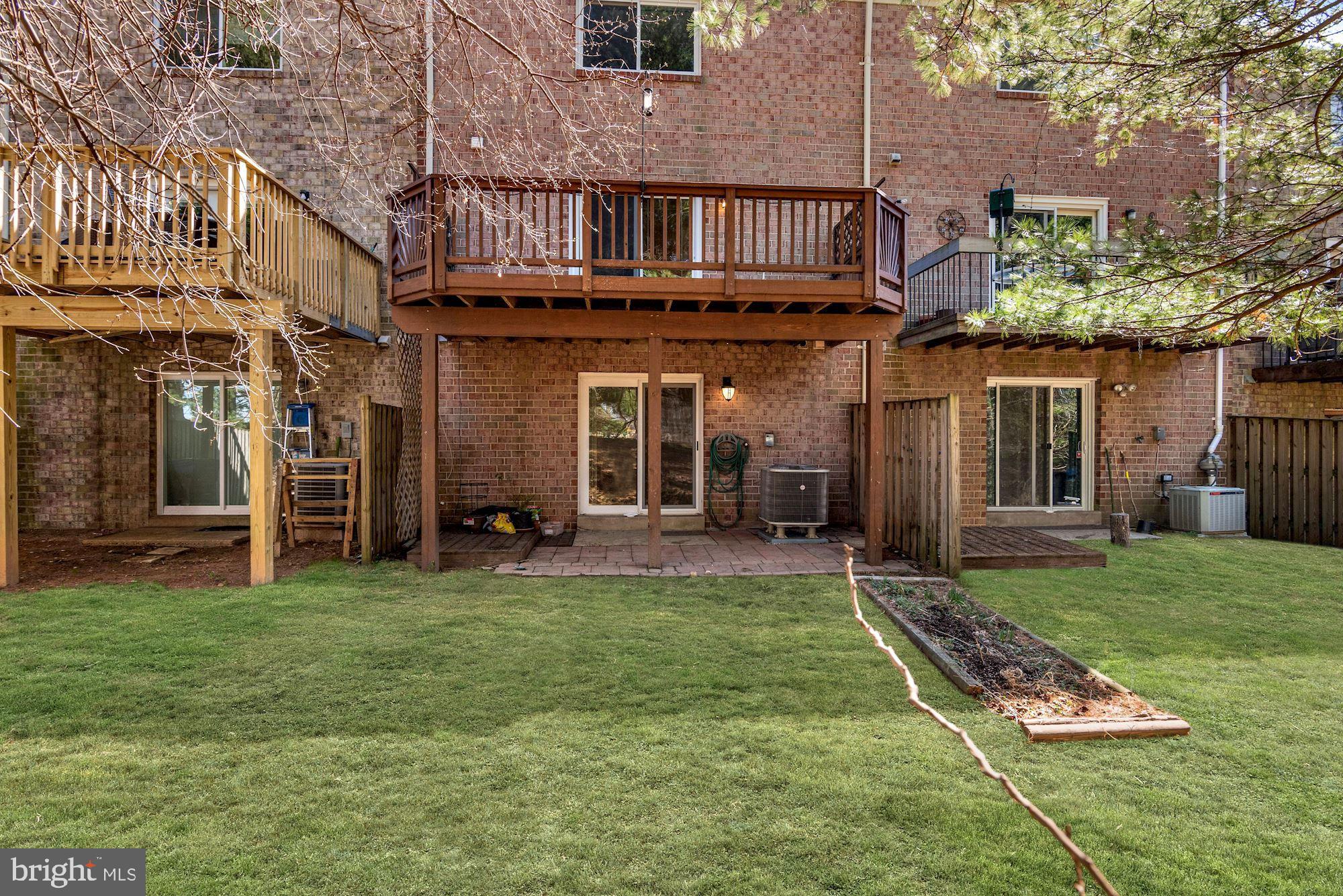 9747 Early Spring Way Columbia, MD 21046 - Photo 27 of 31 Rear Exterior