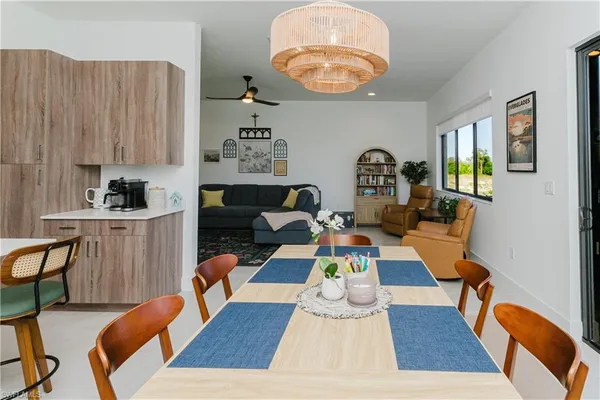 a living room with furniture fireplace and rug