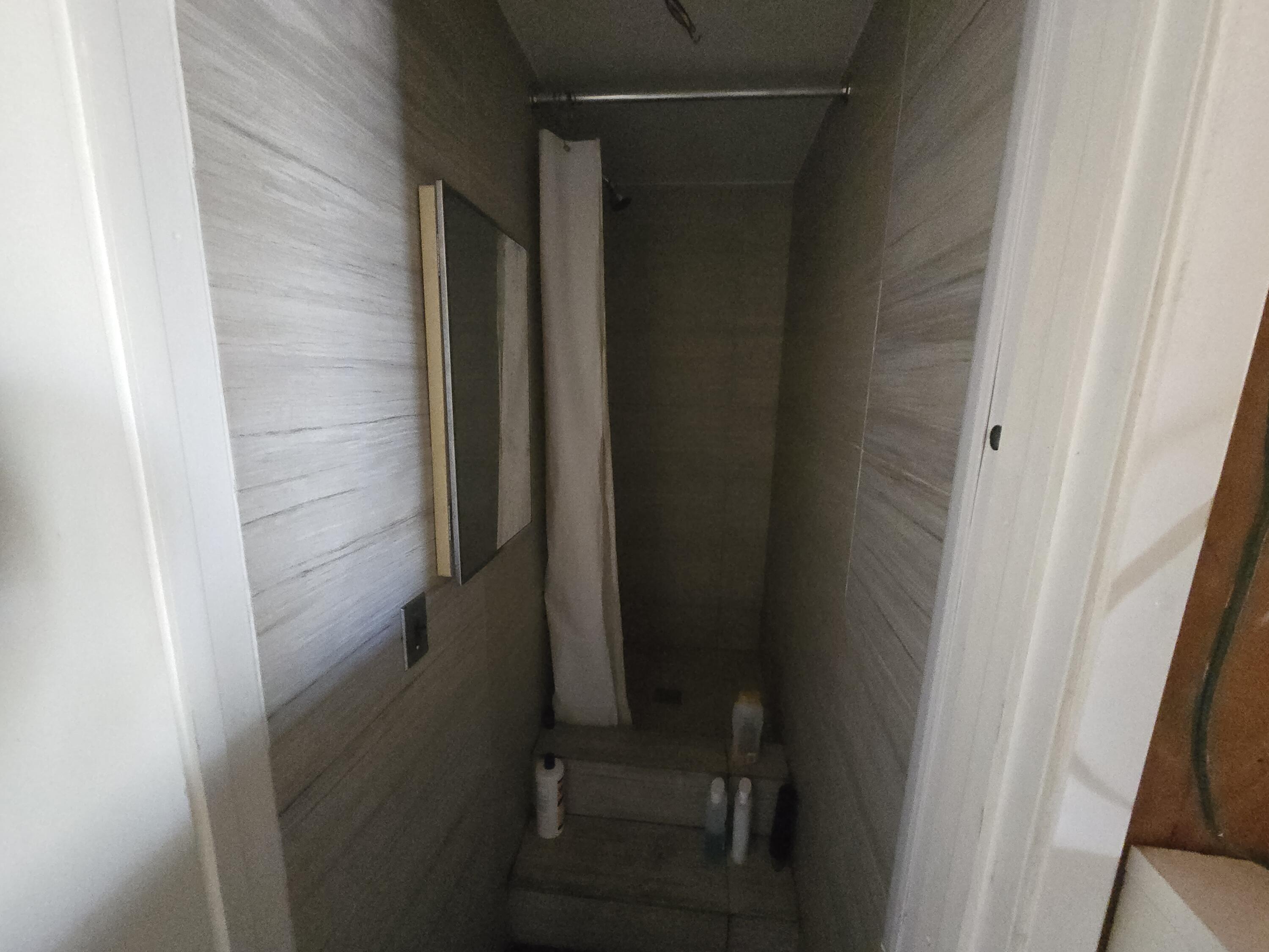 4800 Hansen Ranch Road Garberville, CA 95542 - Photo 5 of 23 a bathroom with a shower