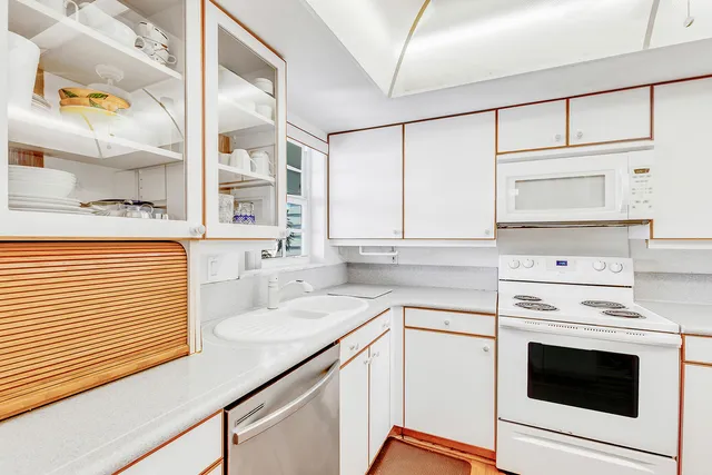 a view of a living room and entryway