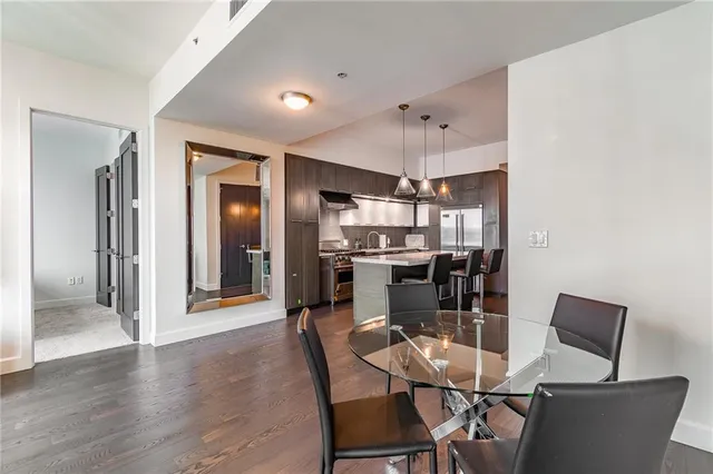 a view of a bedroom with washer and dryer