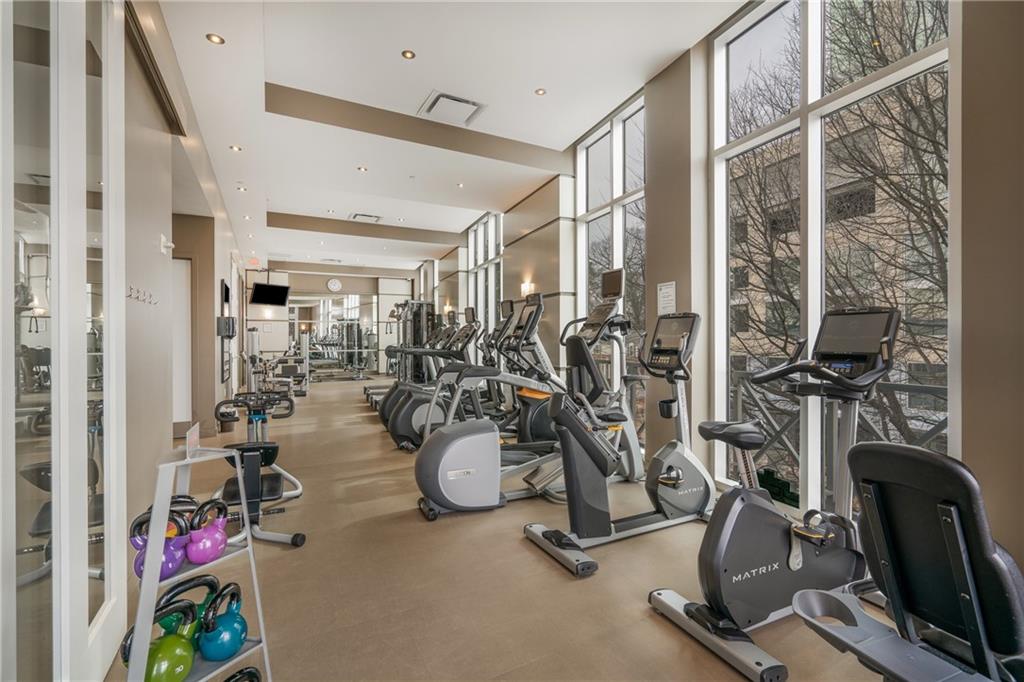 1820 Peachtree Road Northwest, Unit 1111 Atlanta, GA 30309 - Photo 33 of 41 a view of a room with gym equipment