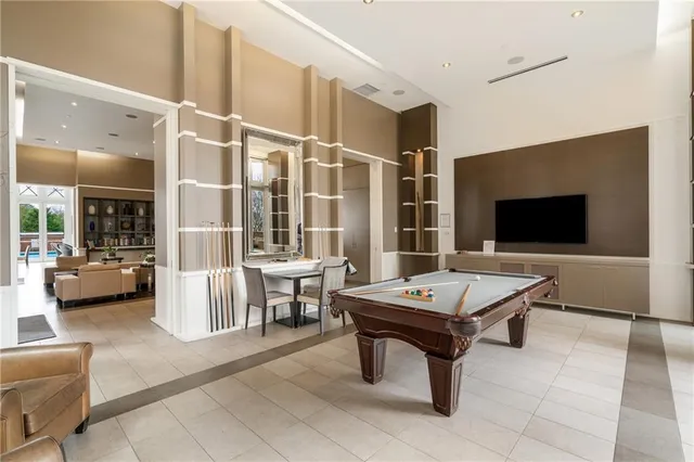 a view of a lobby with black carpet